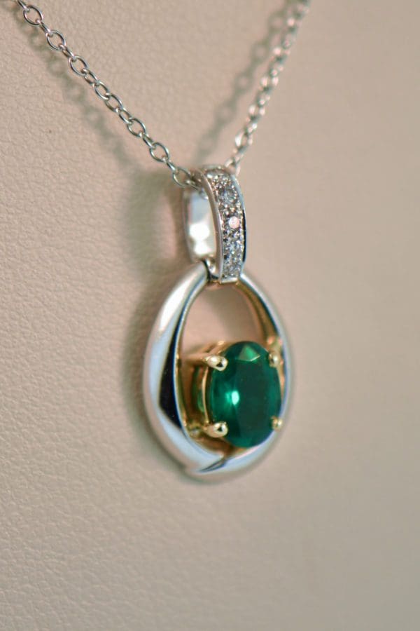 top quality oval natural emerald and diamond pendant white gold