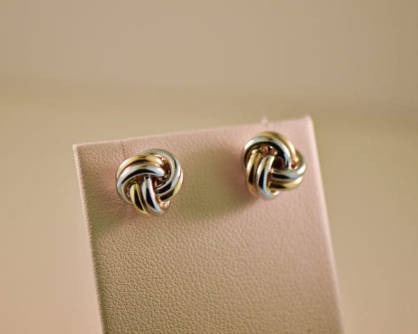 two tone gold love knot stud earrings