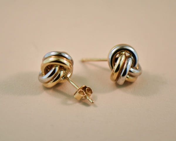 two tone gold love knot stud earrings 2