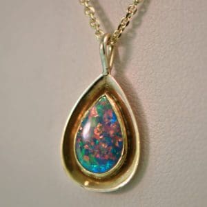 vintage gold pendant bezel set with gem grade black opal 2