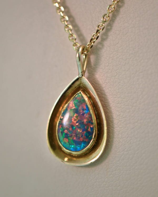 vintage gold pendant bezel set with gem grade black opal 2