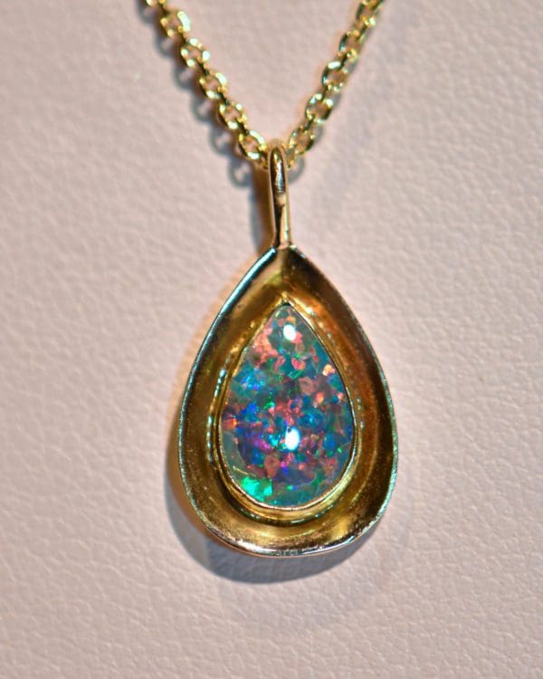 vintage gold pendant bezel set with gem grade black opal 5