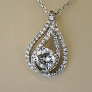 white gold 1.25ct round diamond pear drop pendant