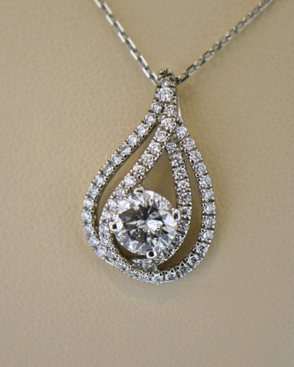 white gold 1.25ct round diamond pear drop pendant