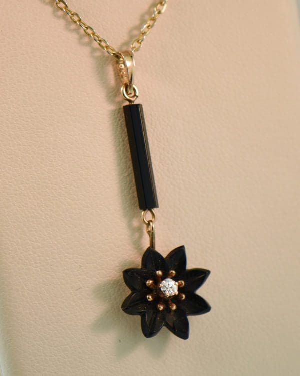 antique carved black onyx and diamond daisy flower pendant