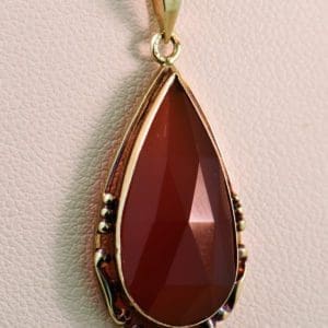 carnelian and gold art deco pendant