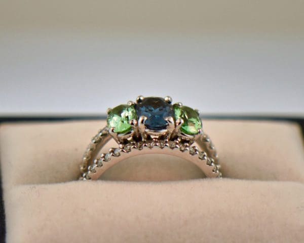 custom three stone ring with blue spinel and mint tourmalines