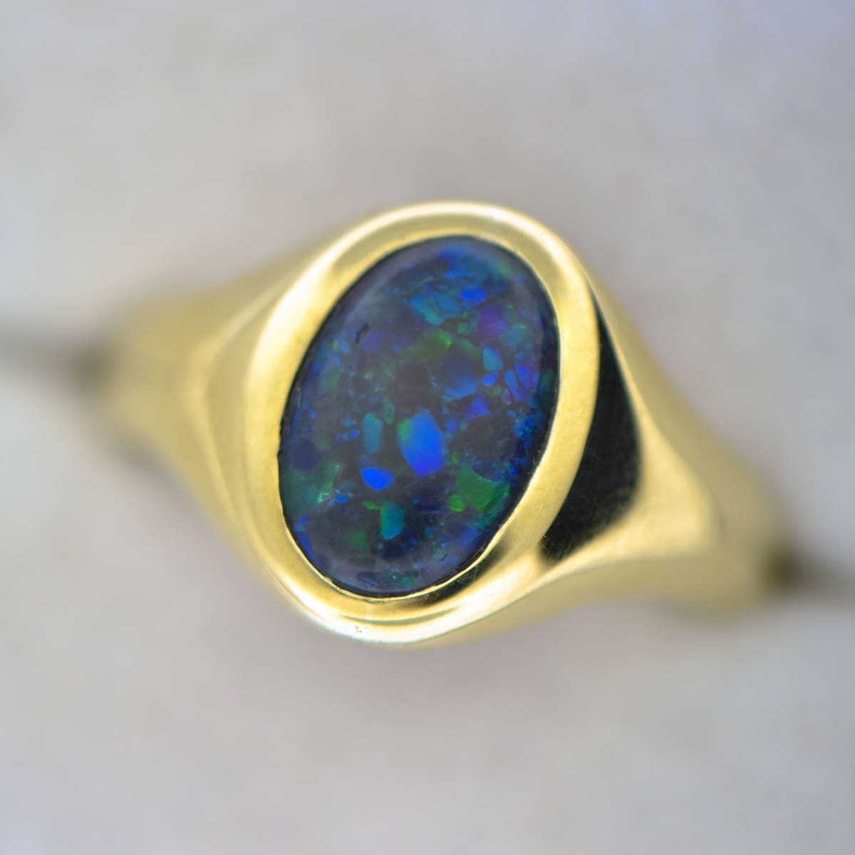 Vintage British Gents Ring with Peacock Hued Black Opal