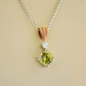 neon yellow mali garnet rose gold pendant
