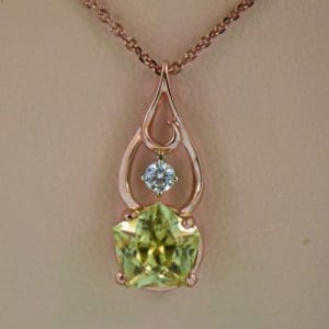 pentagonal chrysoberyl pendant and earrings rose gold