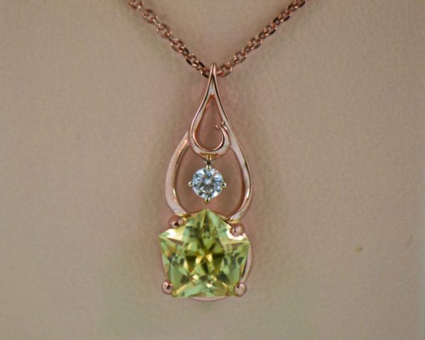 pentagonal chrysoberyl pendant and earrings rose gold