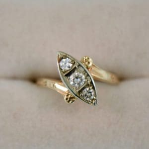 deco boat ring in twotone gold with diamond trio