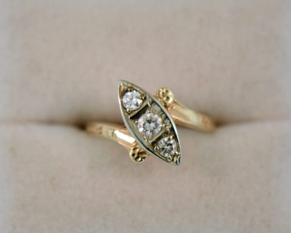 deco boat ring in twotone gold with diamond trio