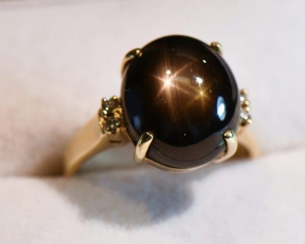 large black star sapphire ladies ring yellow gold 5