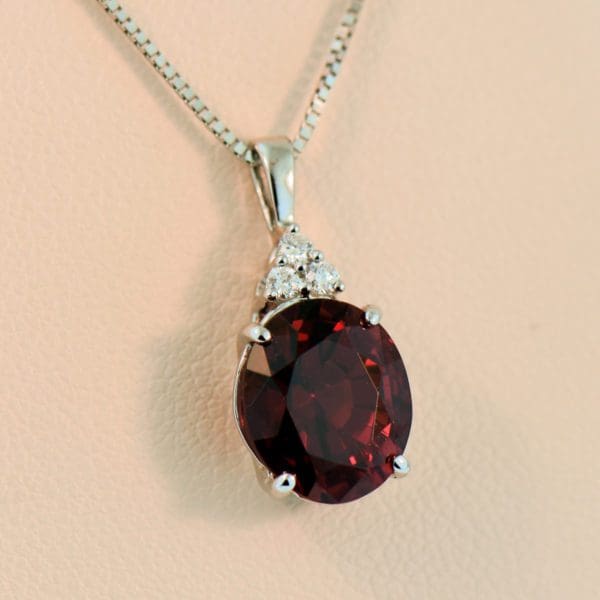 modern classic red garnet and diamond pendant