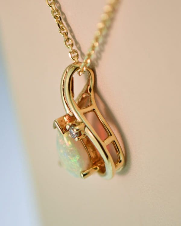 modern estate white pear shaped opal and diamond pendant 2