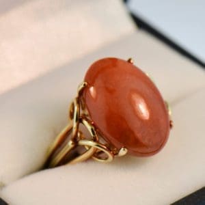 oval cabochon orangey red jadeite jade vintage ring