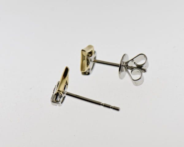 angular diamond twotone gold stud earrings 3