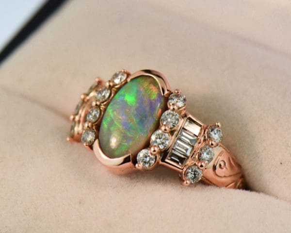 custom rose gold cocktail ring with baguette diamonds and australian opal