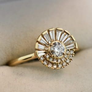 modern diamond baguette and round rising sun ring