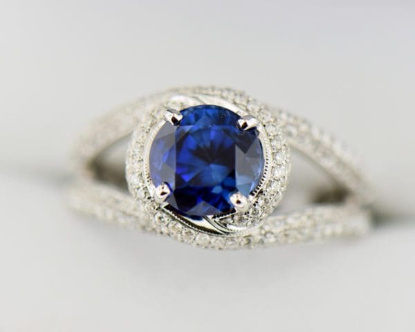 2ct round blue sapphire and pave diamond swirl ring 4
