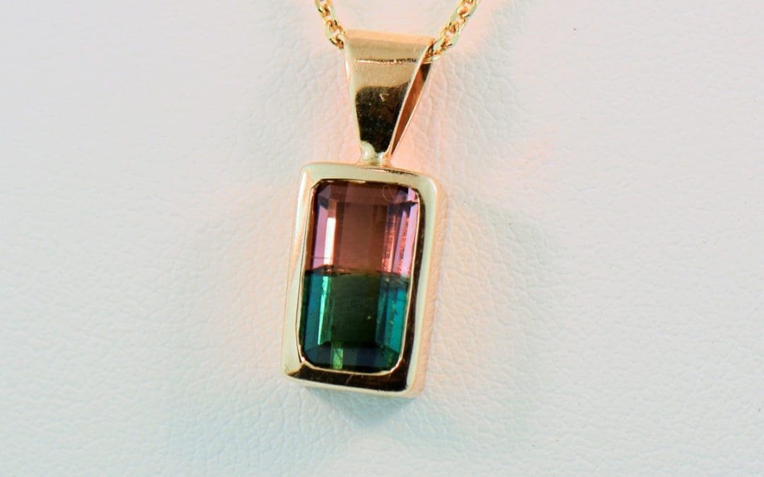 bicolor watermelon tourmaline pendant in 14k yellow bezel