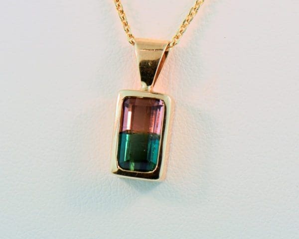 bicolor watermelon tourmaline pendant in 14k yellow bezel