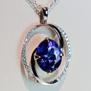 custom oval swirl pendant with gem grade 4ct tanzanite