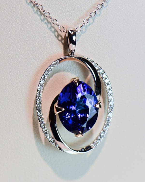 custom oval swirl pendant with gem grade 4ct tanzanite