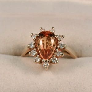 estate pear shape precious topaz and diamond halo ring