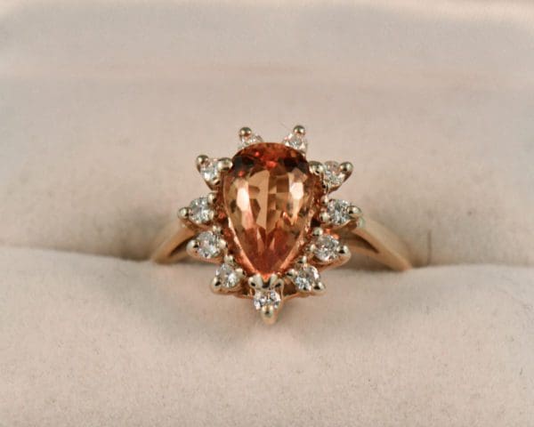 estate pear shape precious topaz and diamond halo ring