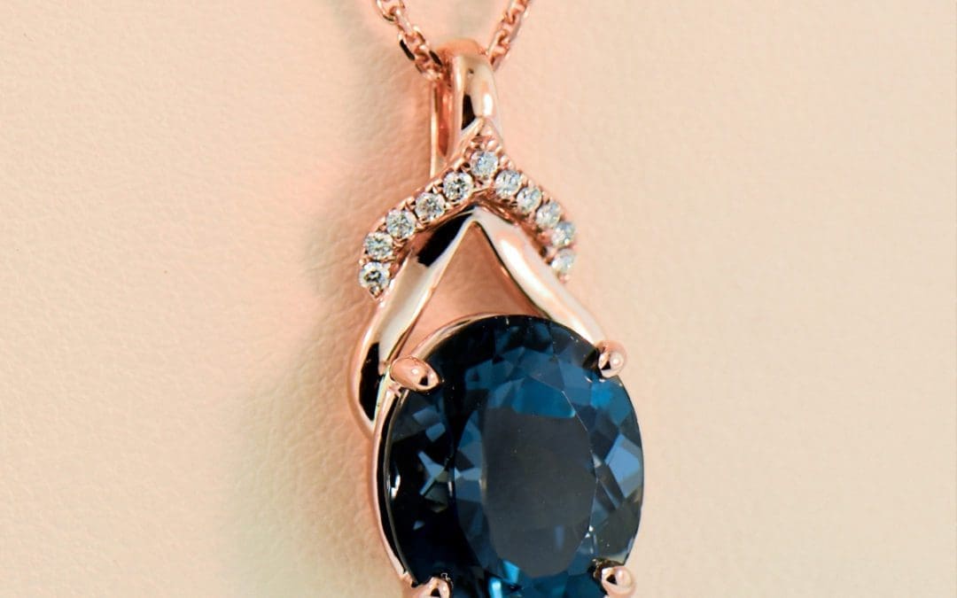 london blue topaz rose gold pendant