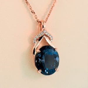 london blue topaz rose gold pendant