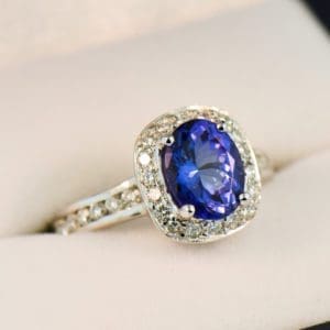 oval tanzanite and diamond halo ring white gold