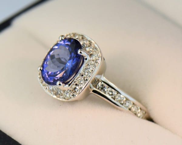 oval tanzanite and diamond halo ring white gold 3