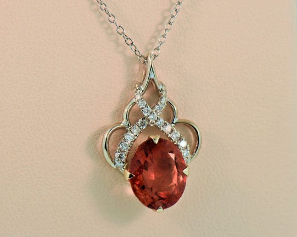 peachy orange oregon sunstone and diamond pendant