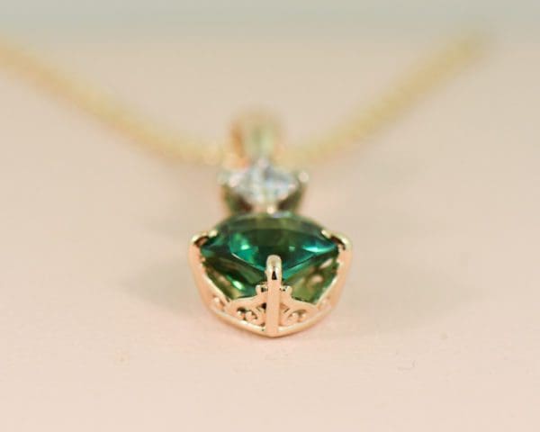 teal tourmaline and diamond pendant in gold 5