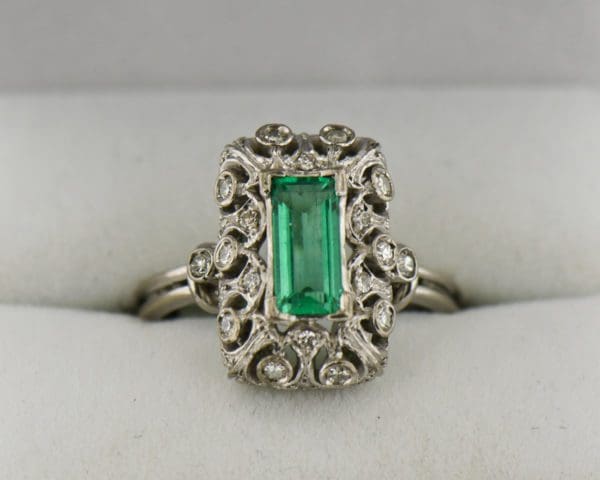 vintage platinum ring with filigree diamonds and elongated emerald 2