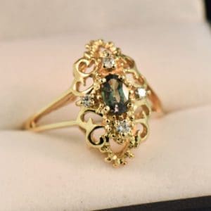 yellow gold cocktail ring with alexandrite and diamonds