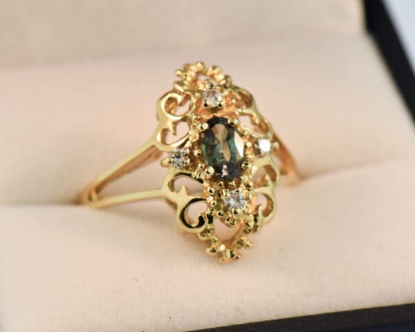 yellow gold cocktail ring with alexandrite and diamonds