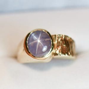 estate unisex ring with lavender star sapphire and textured gold