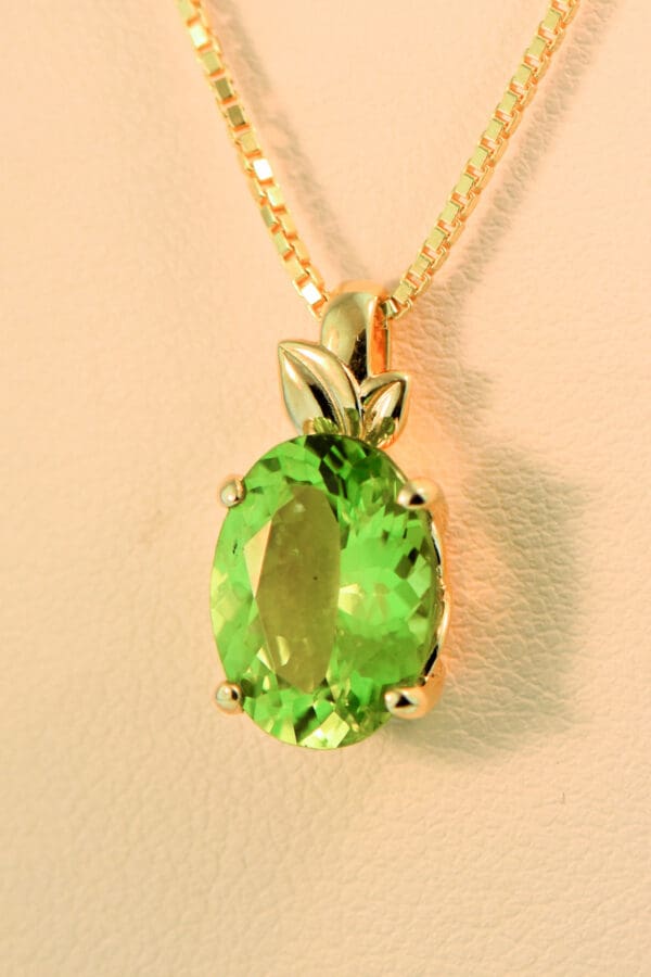 burmese peridot solitaire pendant with leaf trim 4