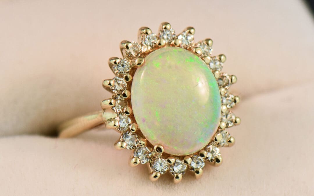 classic australian opal and diamond diana style halo ring