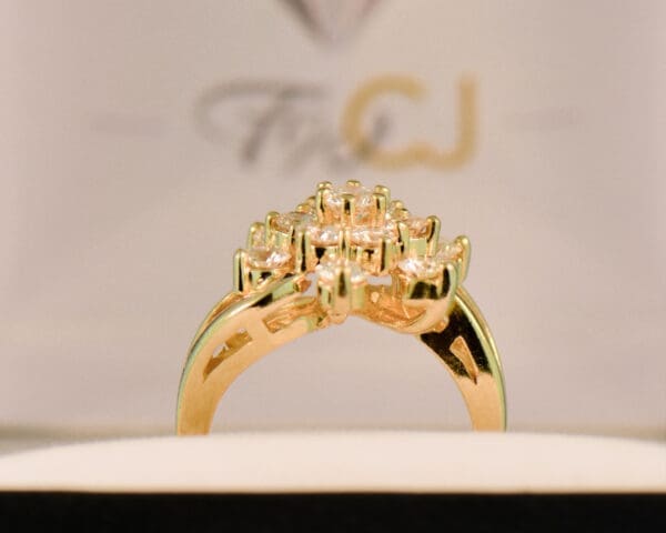 impressive yellow gold and diamond cluster star cocktail ring 3