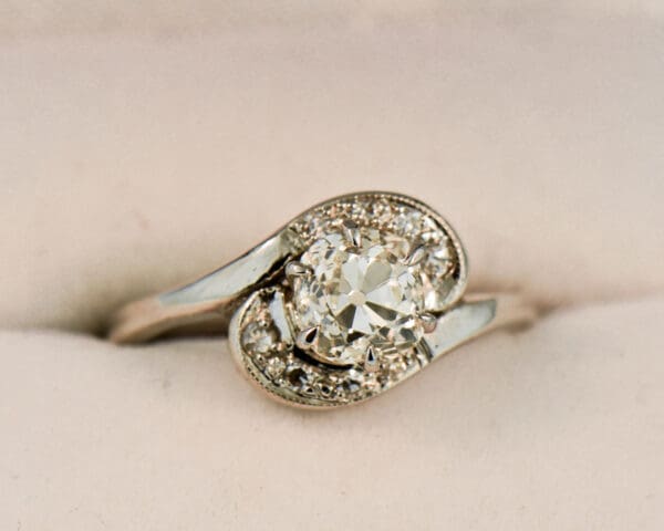 mid century bypass engagement ring set with 1ct old mine cut diamond