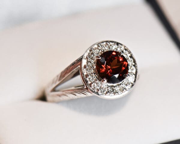 red hessonite garnet and diamond halo ring with carved design 3