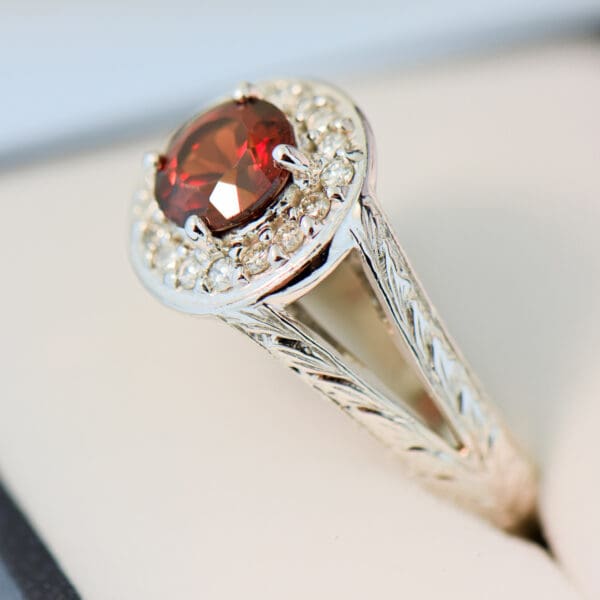 red hessonite garnet and diamond halo ring with carved design 4