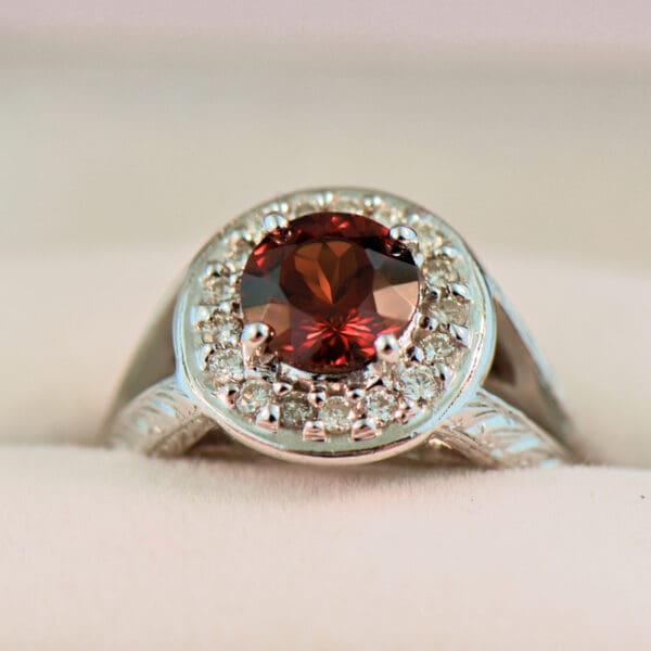 red hessonite garnet and diamond halo ring with carved design 5
