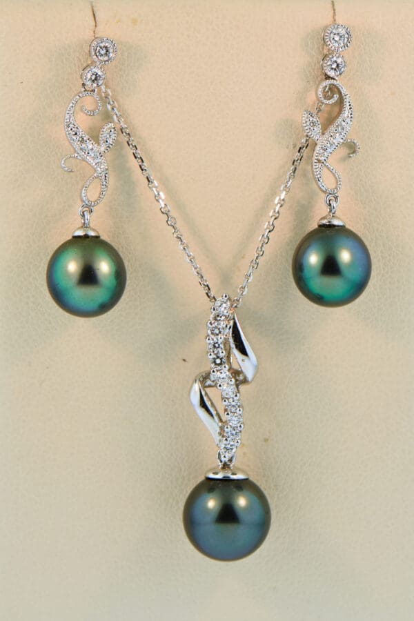 tahitian pearl and diamond pendant and earring set