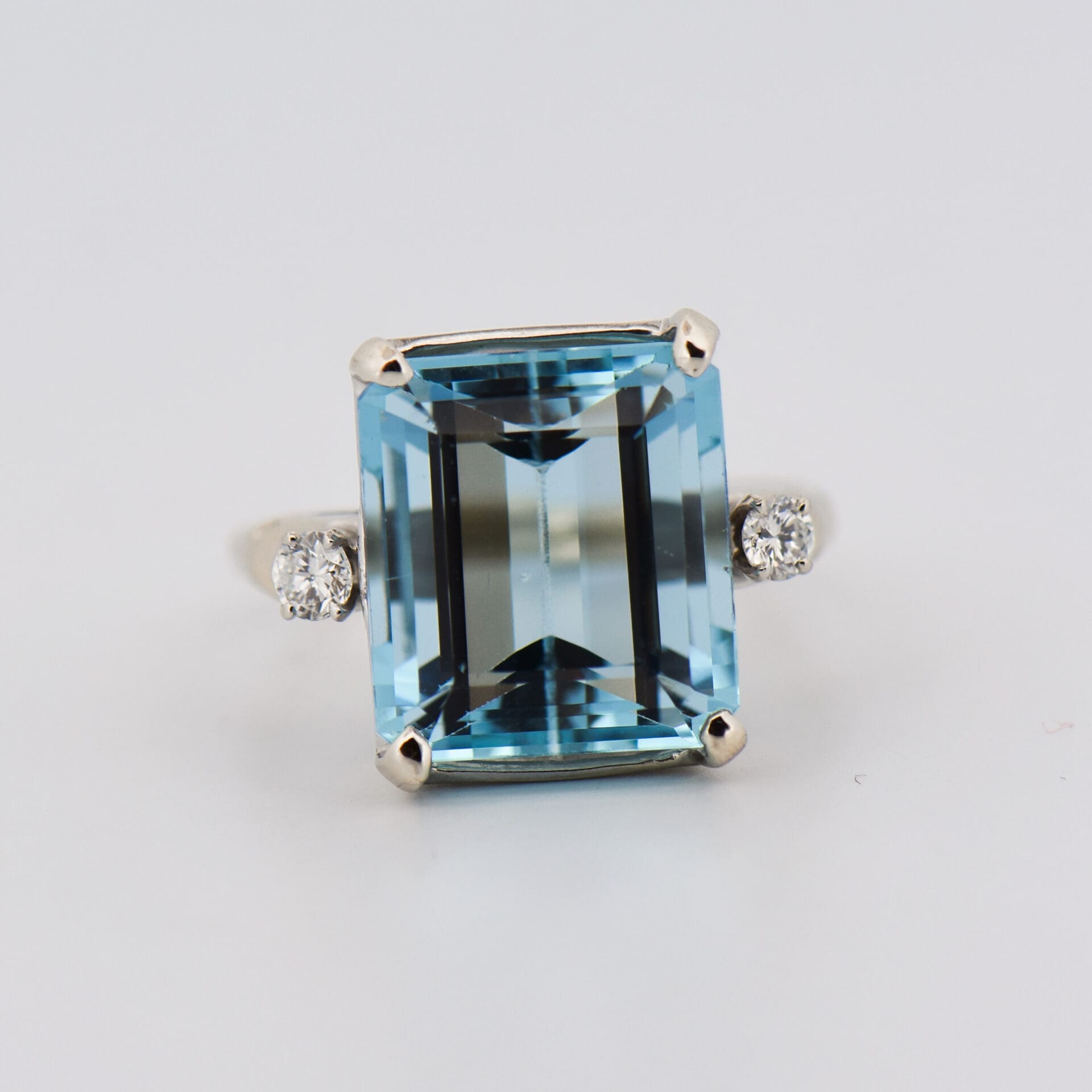 Emerald Cut Aquamarine & Diamond Cocktail Ring | Exquisite Jewelry